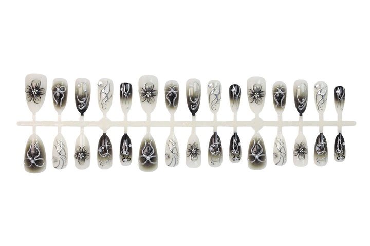 Artificial nails with elegant floral and glittering decorations Stornfield