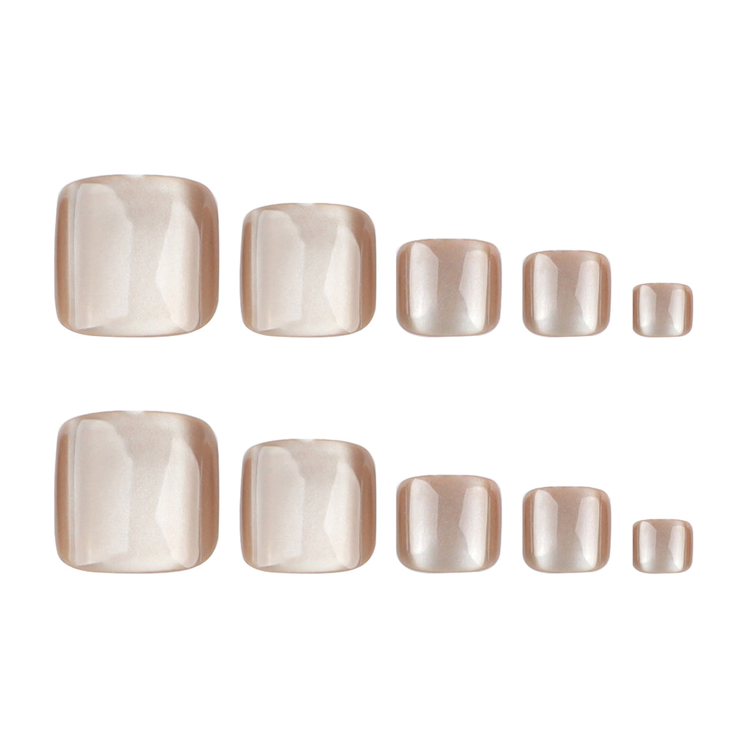 Artful toenail design with glossy accents Stornfield