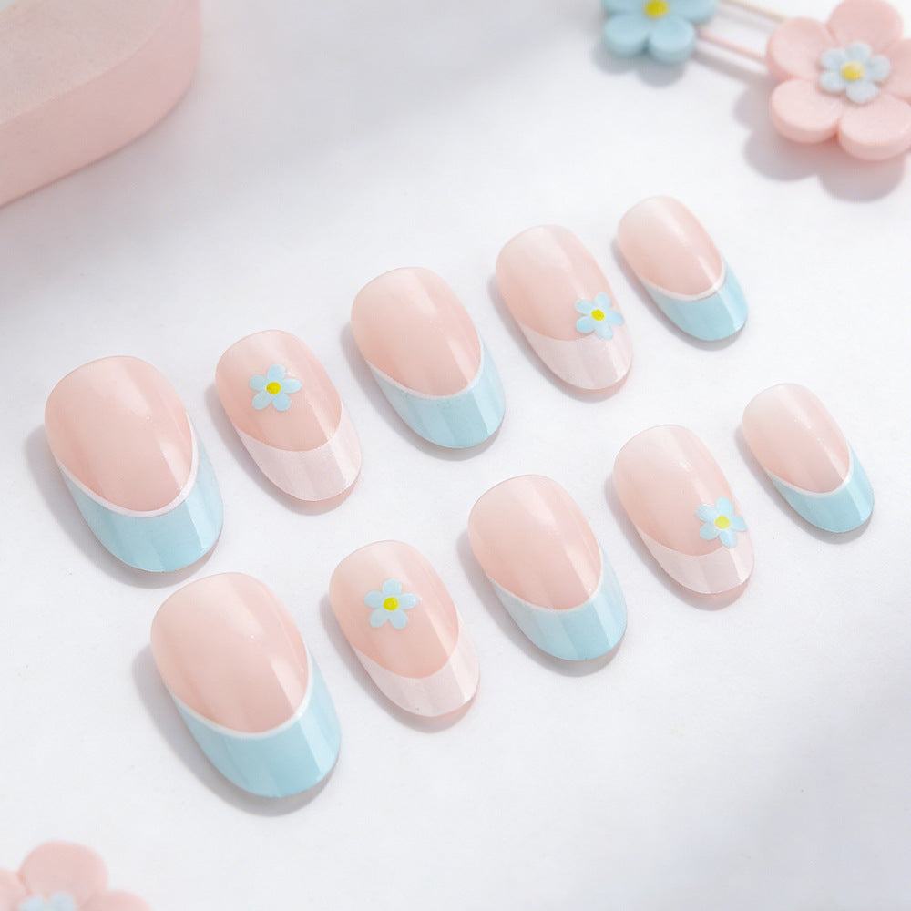 Elegant French Tip Press-On Nails with Floral Accents Stornfield