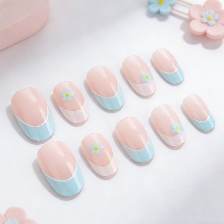 Elegant French Tip Press-On Nails with Floral Accents Stornfield