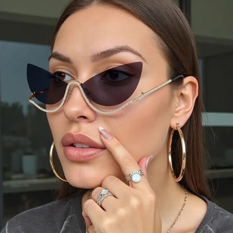Women's extravagantly shaped Cat-Eye sunglasses with sparkling appliqués Stornfield