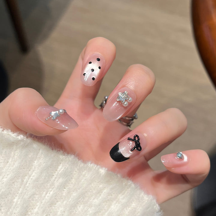 Elegant Nail Art Extensions with Pearl Accents Stornfield