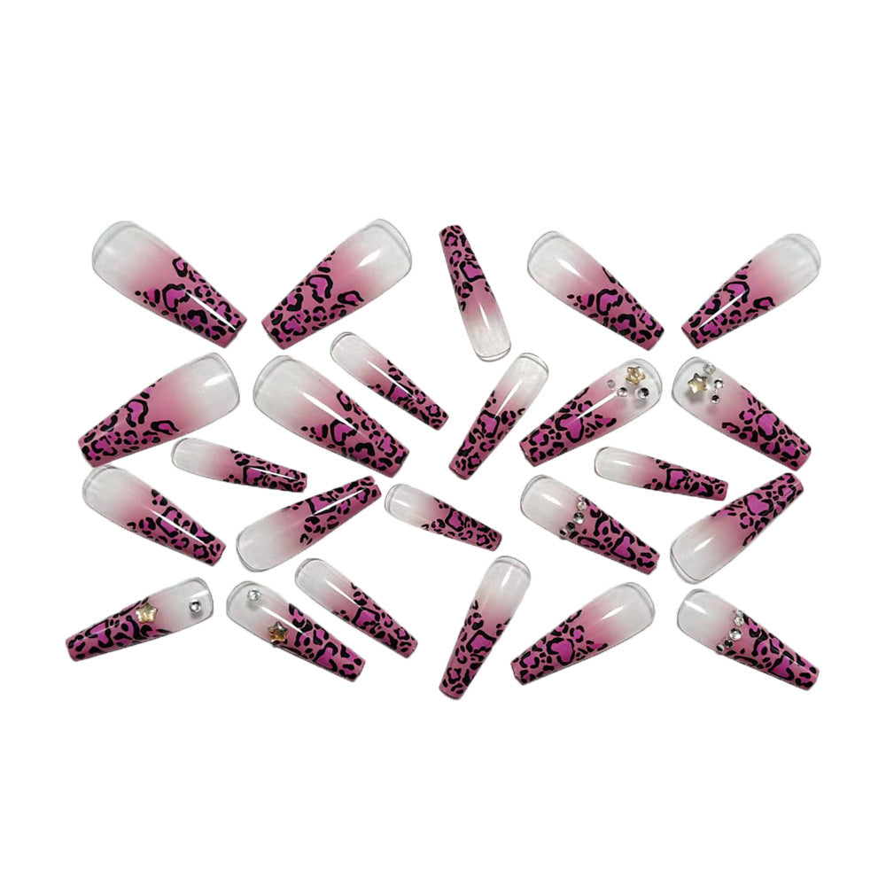 Artificial nails with leopard pattern and rhinestone details Stornfield