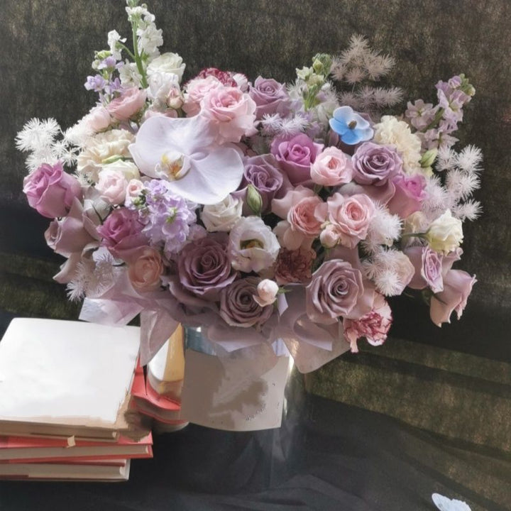 Decorative Floral Arrangement with Stylish Vase