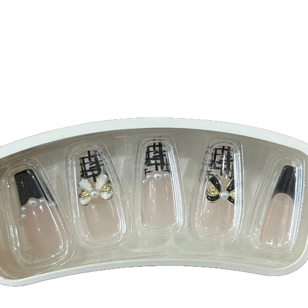 Glamorous nail designs with pearl and rhinestone accents Stornfield