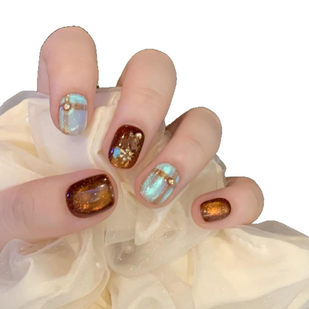 Artificial nail art tips with shimmer and glitter Stornfield