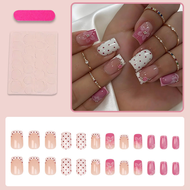 Artificial nail set with playful flower and dot motif Stornfield