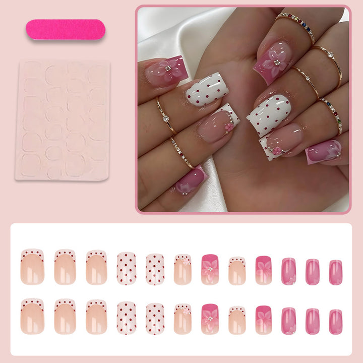 Artificial nail set with playful flower and dot motif Stornfield