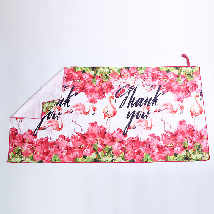 Beach towel with vibrant flamingo motifs and quick-drying material Stornfield