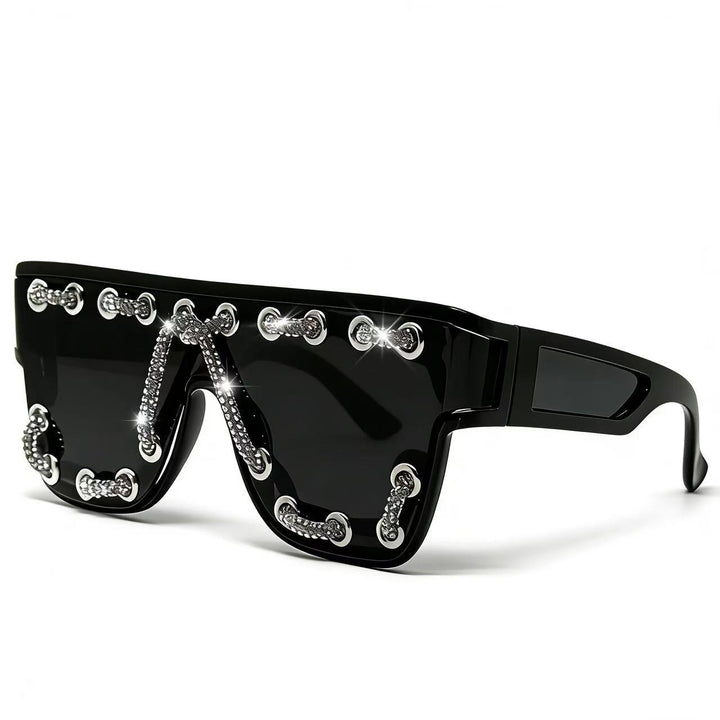 Ladies sunglasses with extravagant design and decorative chain embellishment Stornfield