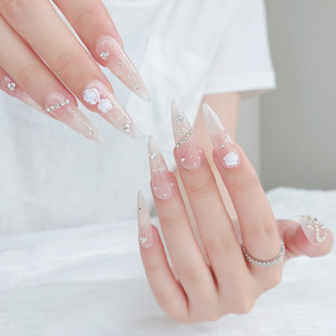 Elegant Stiletto Press-On Nail Art Set with Decorative Floral and Glitter Accents