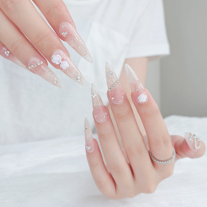 Elegant Stiletto Press-On Nail Art Set with Decorative Floral and Glitter Accents