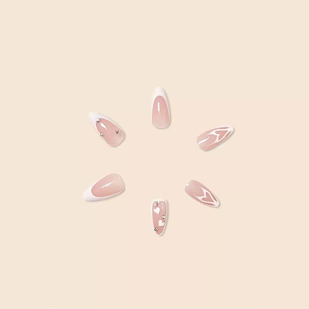 Artistic Heart-Designed Nail Enhancements