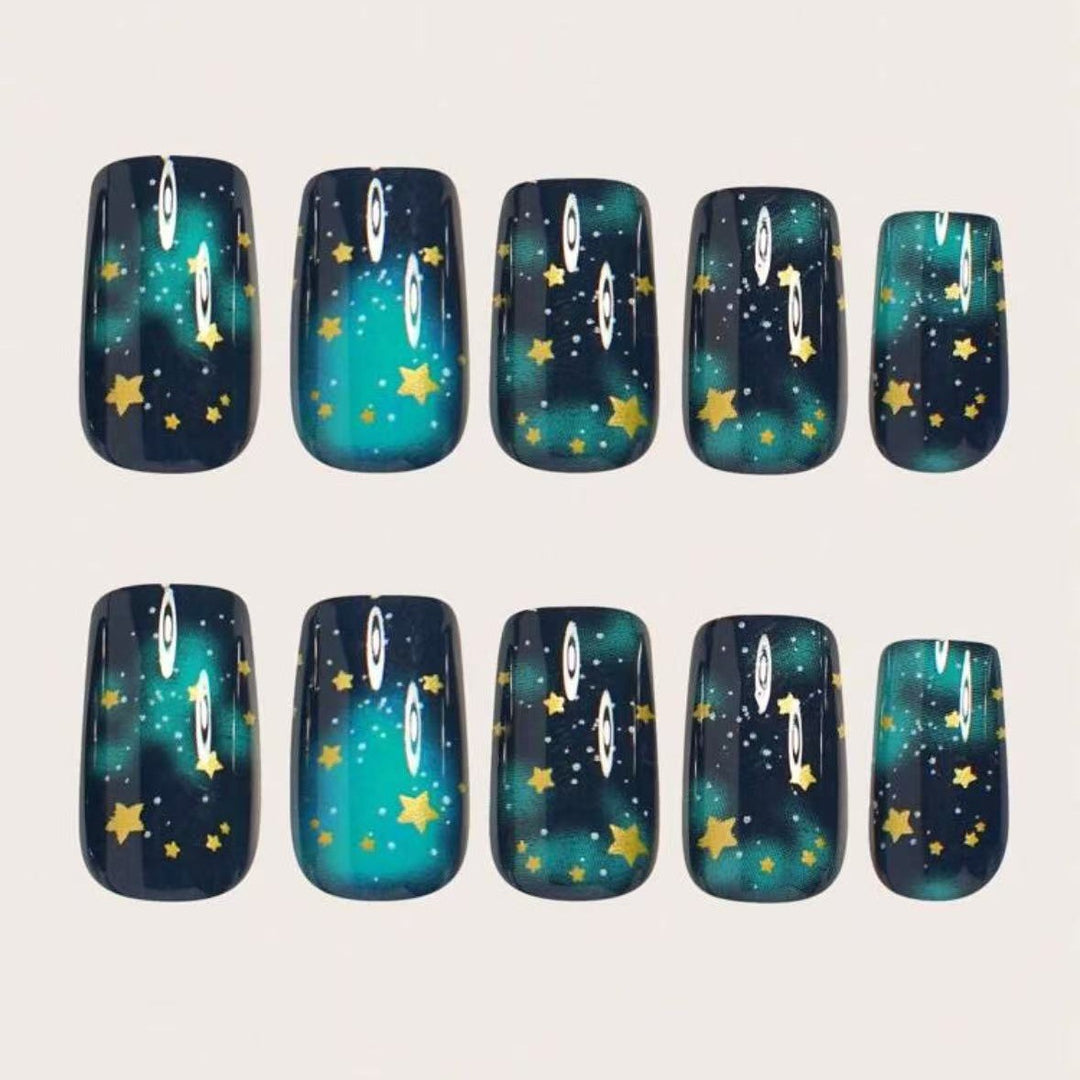 Glitter nail polish with star accents Stornfield