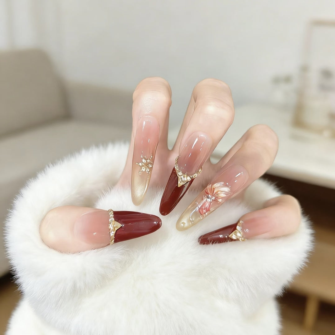 Elegant Stiletto Nail Art Extensions with Decorative Accents