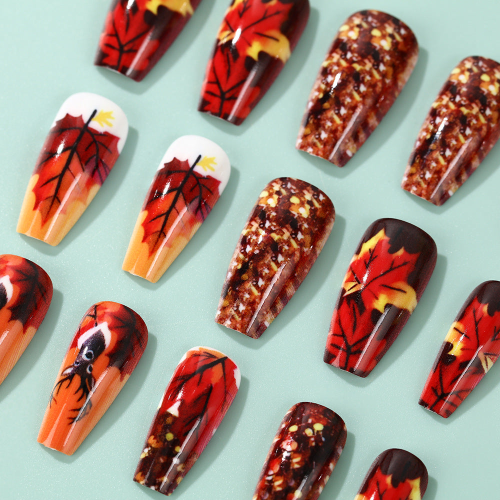 Artificial nails in autumn leaf design Stornfield
