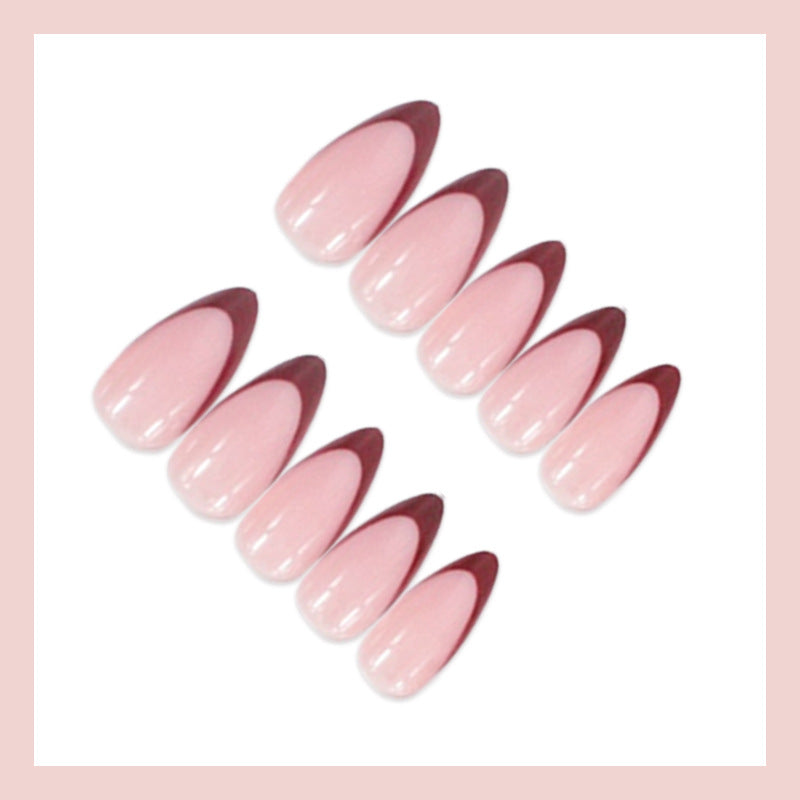 Artificial nail set with elegant French tips and modern accents Stornfield