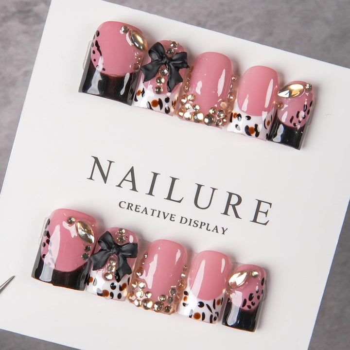 Decorative Press-On Nail Art with Gem Accents