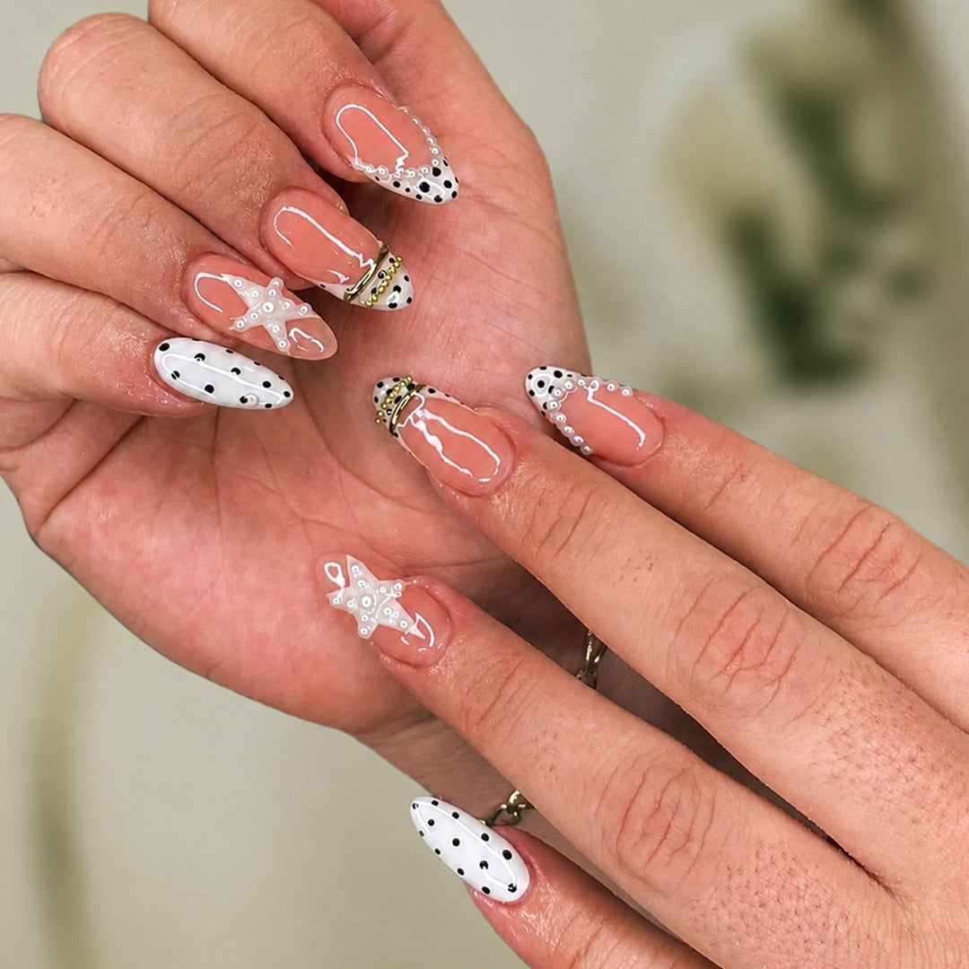 Nail set with elegant pearl and dot accents Stornfield