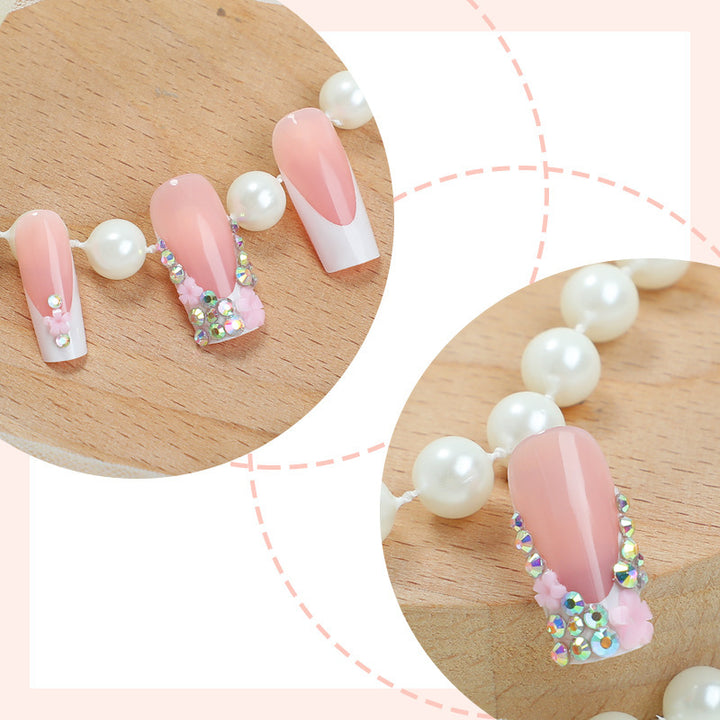 Nail set with elegant flower and glitter decorations Stornfield
