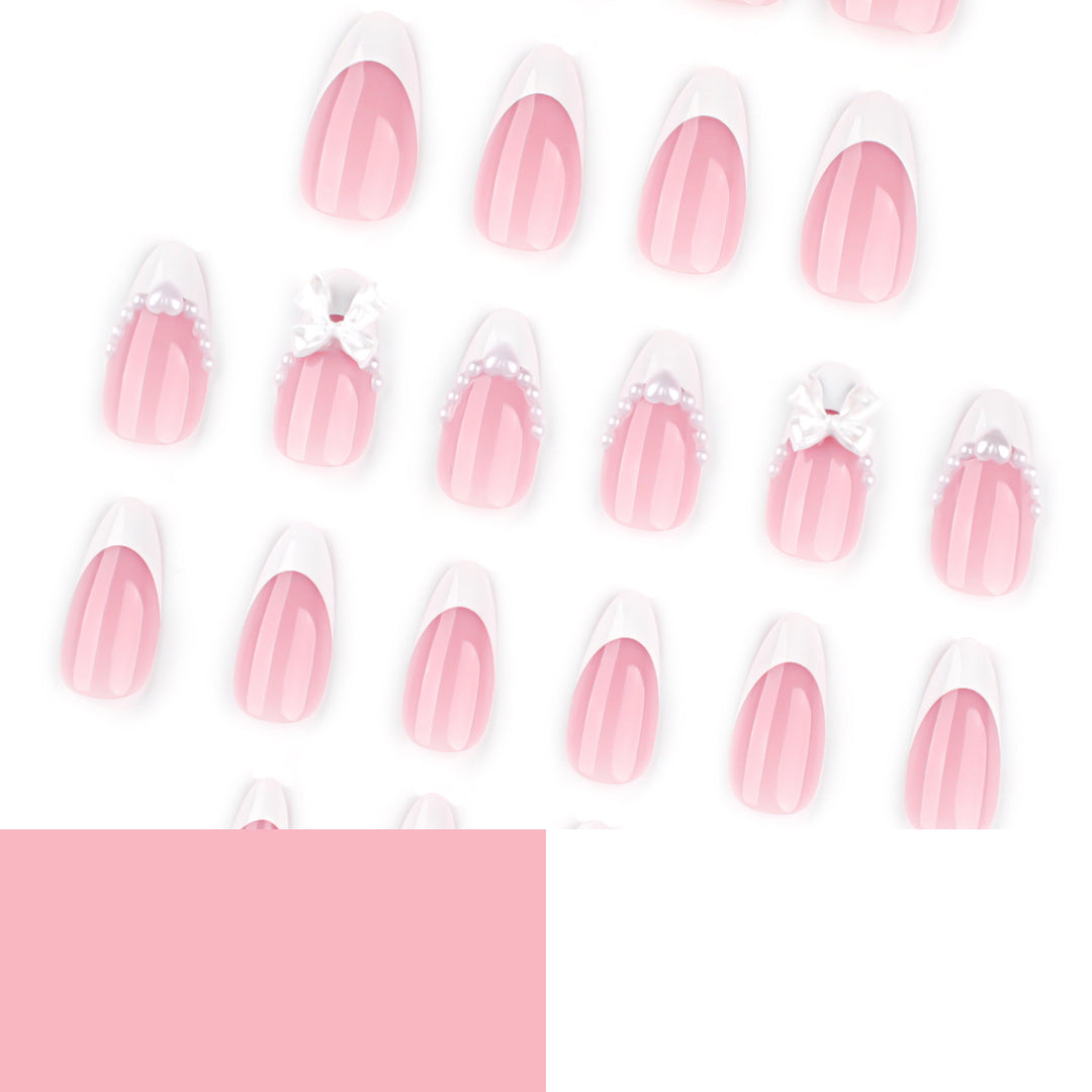 Artful Nail Extensions with Bead and Bow Designs Stornfield