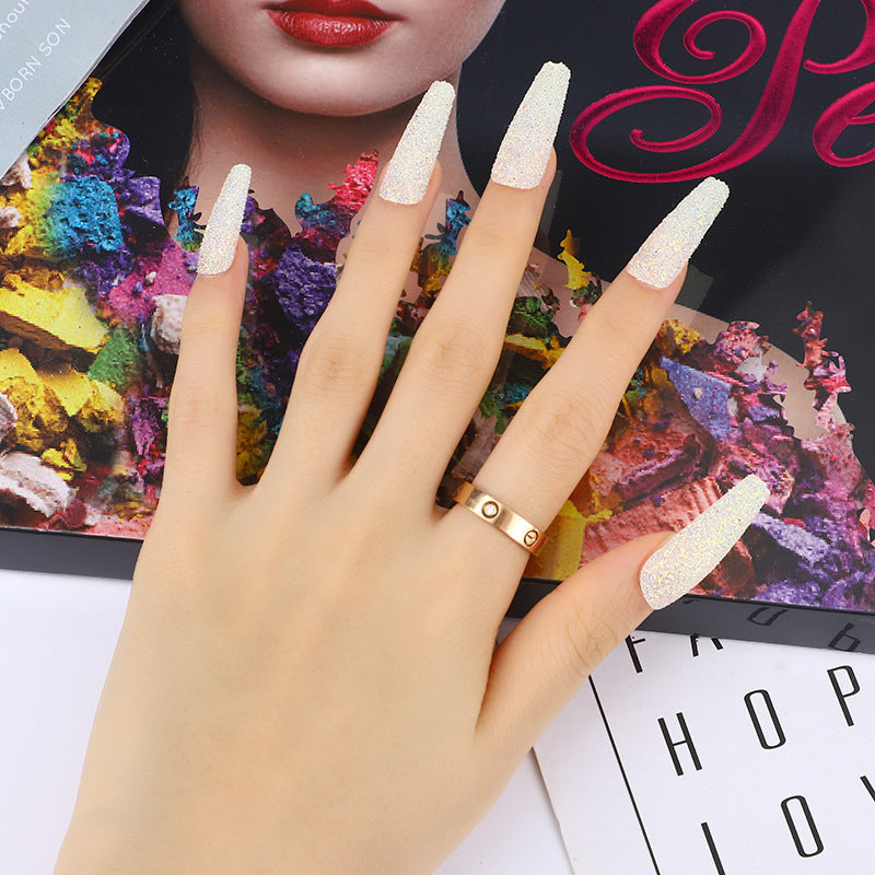 Glamorous artificial nails with glitter effects Stornfield