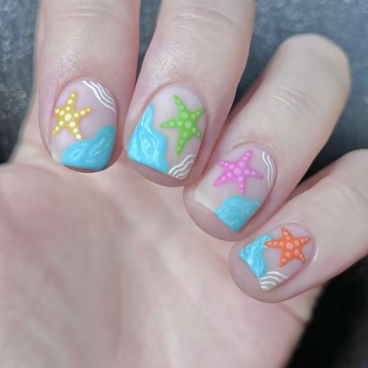 Artistic Beach-Themed Nail Art Stornfield