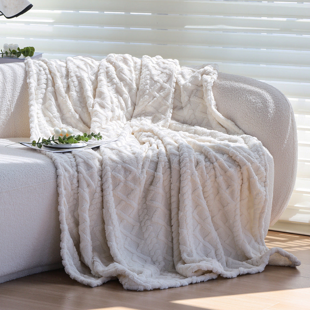 Cuddle blanket with textured surface