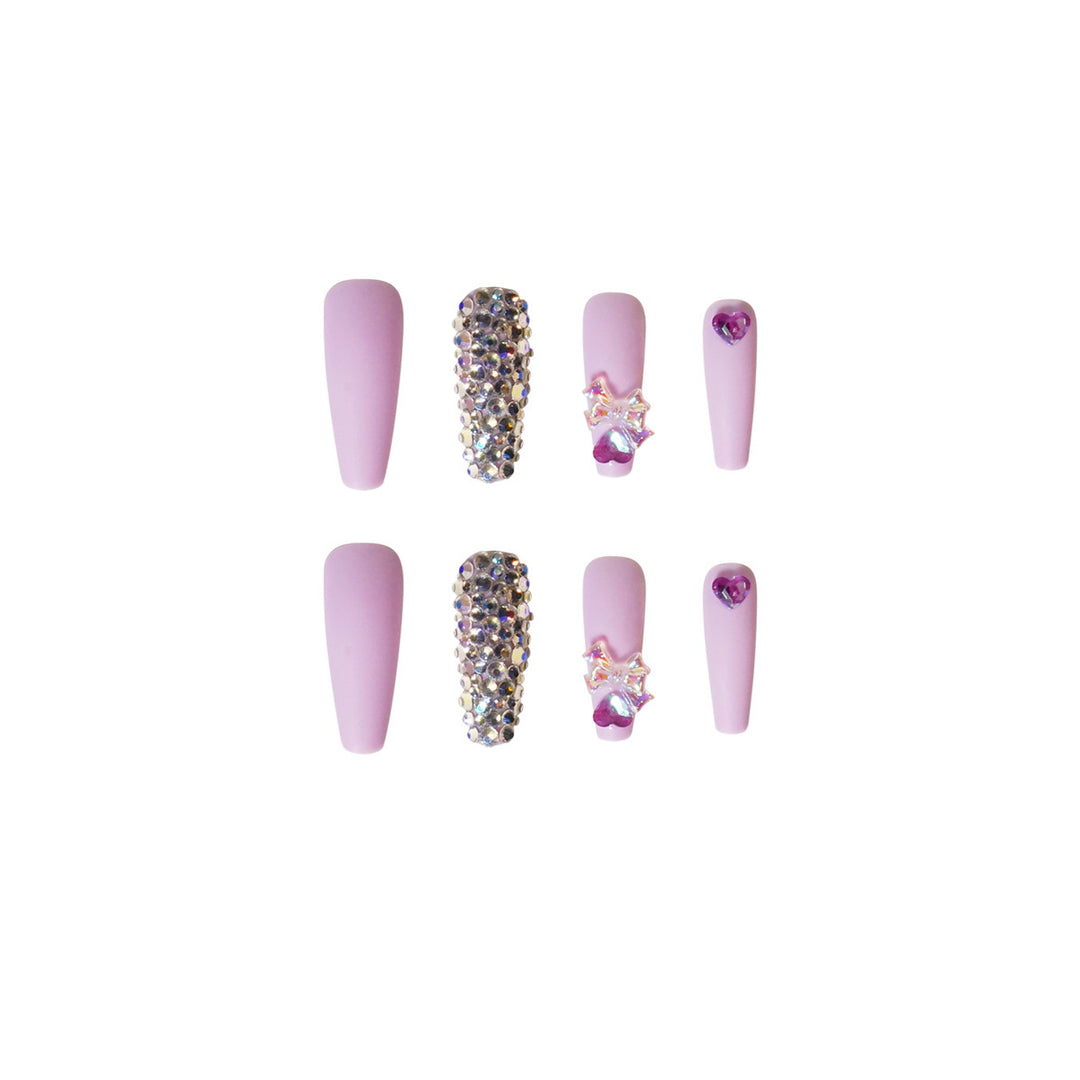 Artistic Stiletto Nails with Glitter and Flower Decorations Stornfield