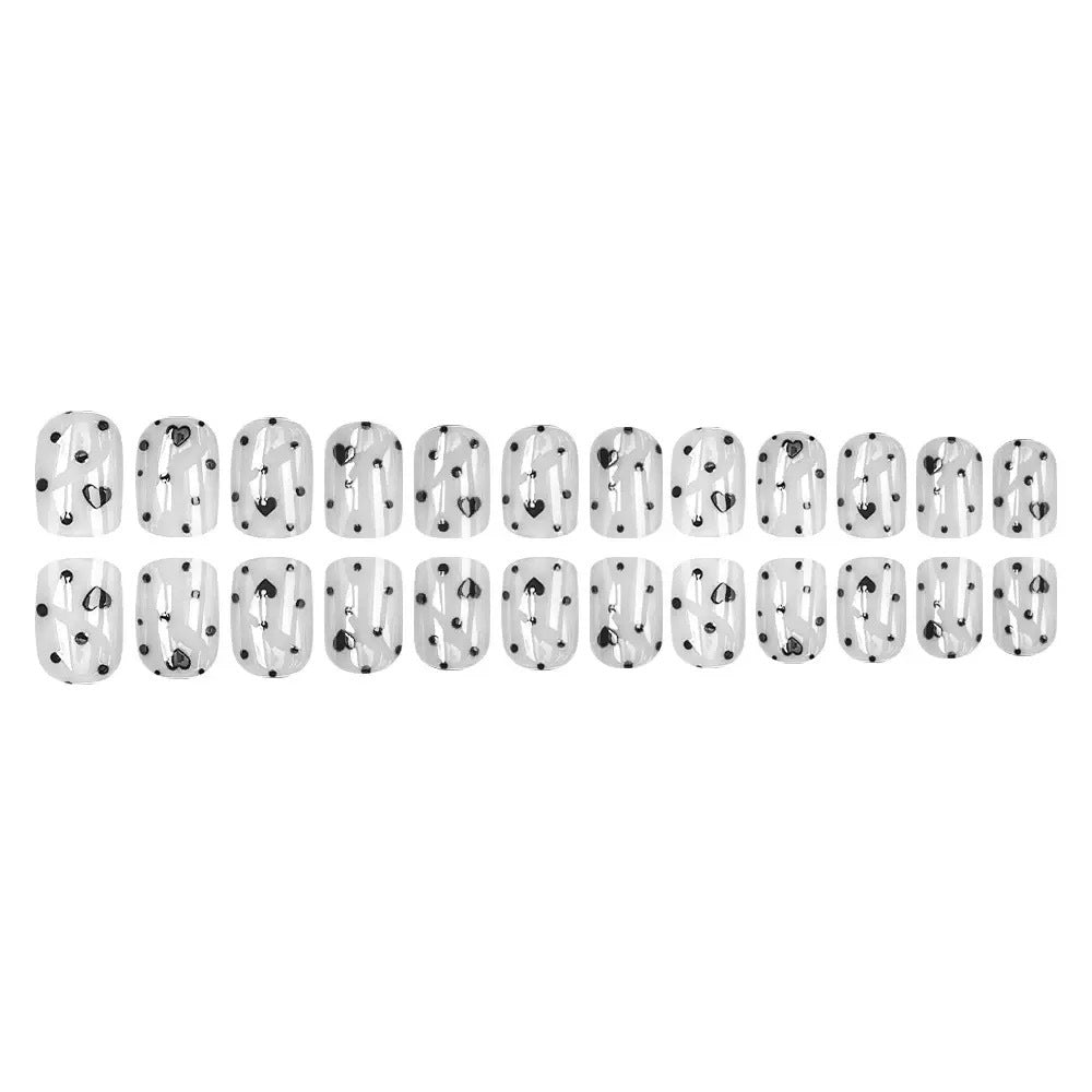 Nail art set with fashionable heart and dot design Stornfield