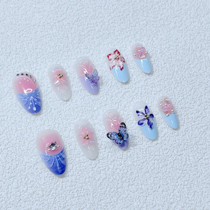 Artful Nail Art with Floral Details and Butterflies Stornfield