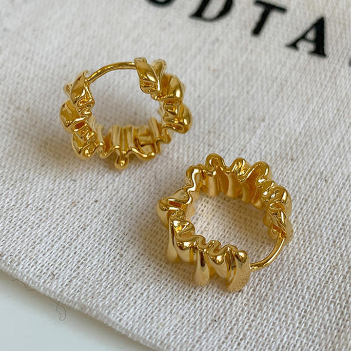 Stylish studs in modern ribbed design Stornfield