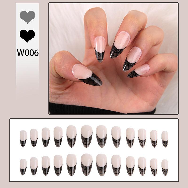 Artful nail tips with elegant spider web pattern Stornfield