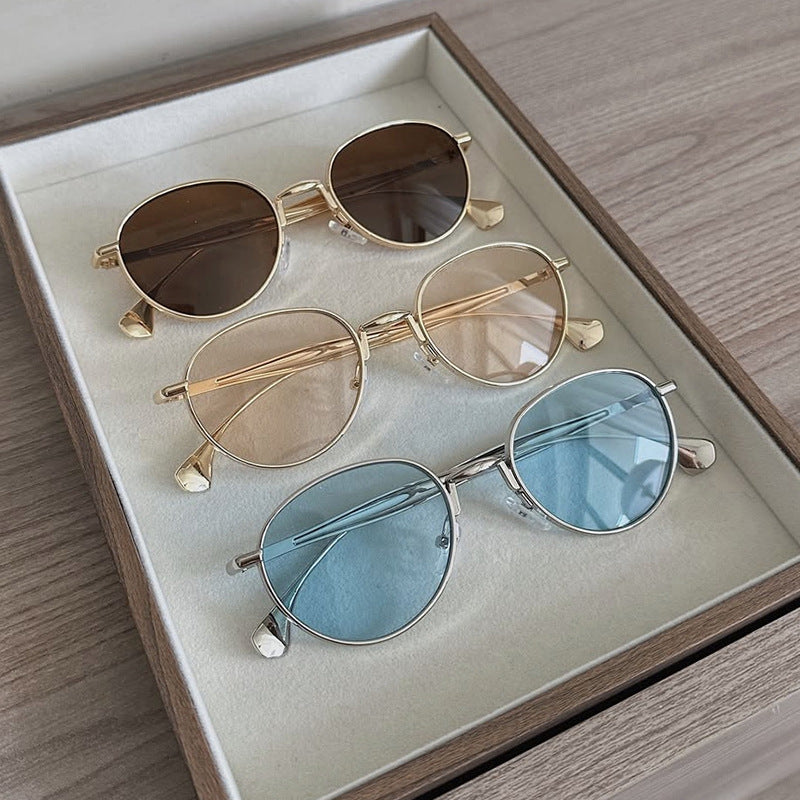 Women's round sunglasses with elegant metal frame and UV protection Stornfield