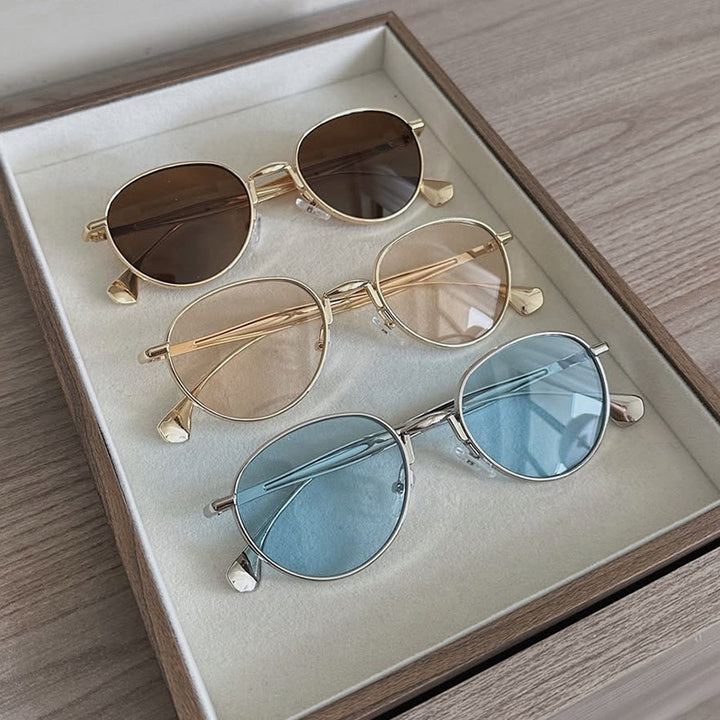 Women's round sunglasses with elegant metal frame and UV protection Stornfield