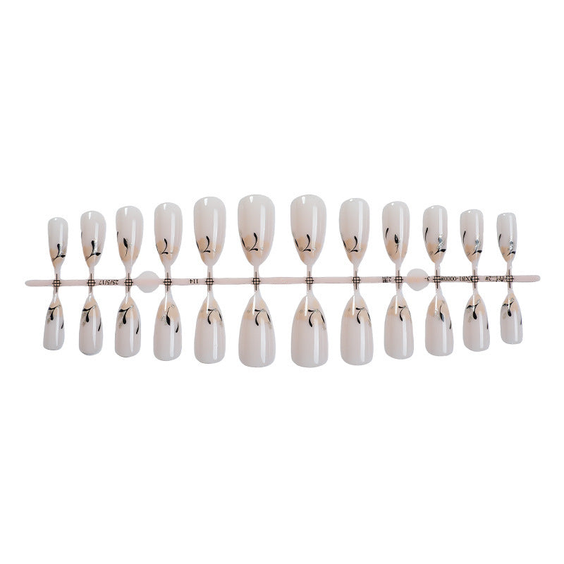 Creative nail art set with fine black and white decorations Stornfield