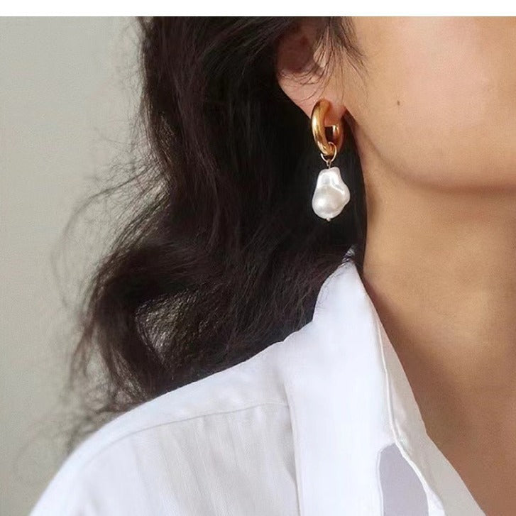 Fashionable earrings with double pearls Stornfield