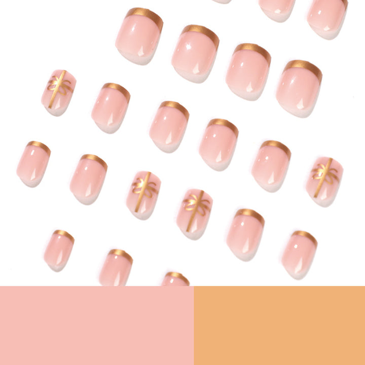 Elegant nail design with gold accents Stornfield