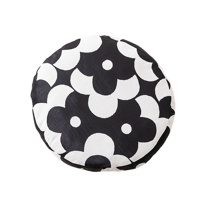 Round decorative seat cushion with floral jacquard structure