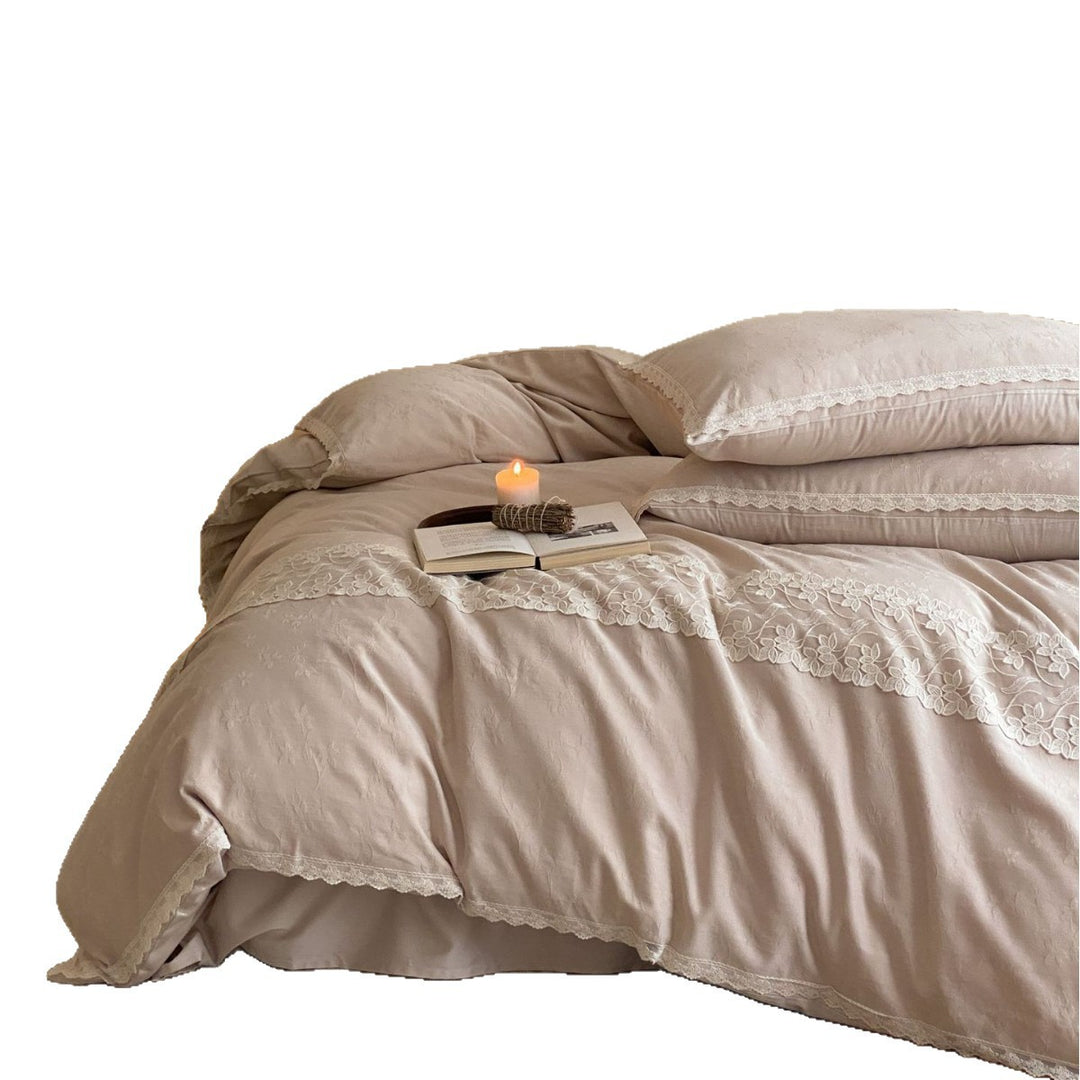 Embroidered cotton satin bed linen set with lace ruffle and subtle jacquard relief