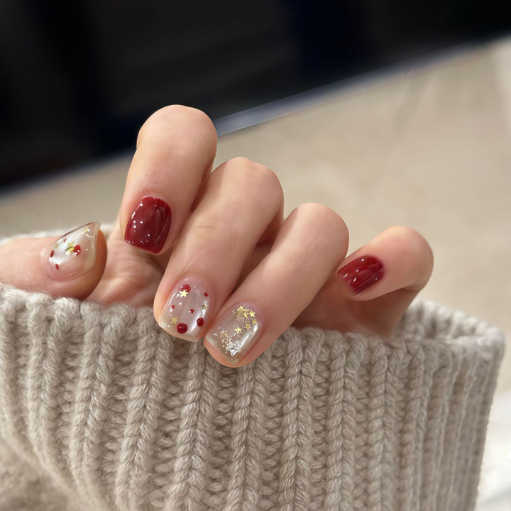 Nail set with sparkling glitter details and creative designs Stornfield