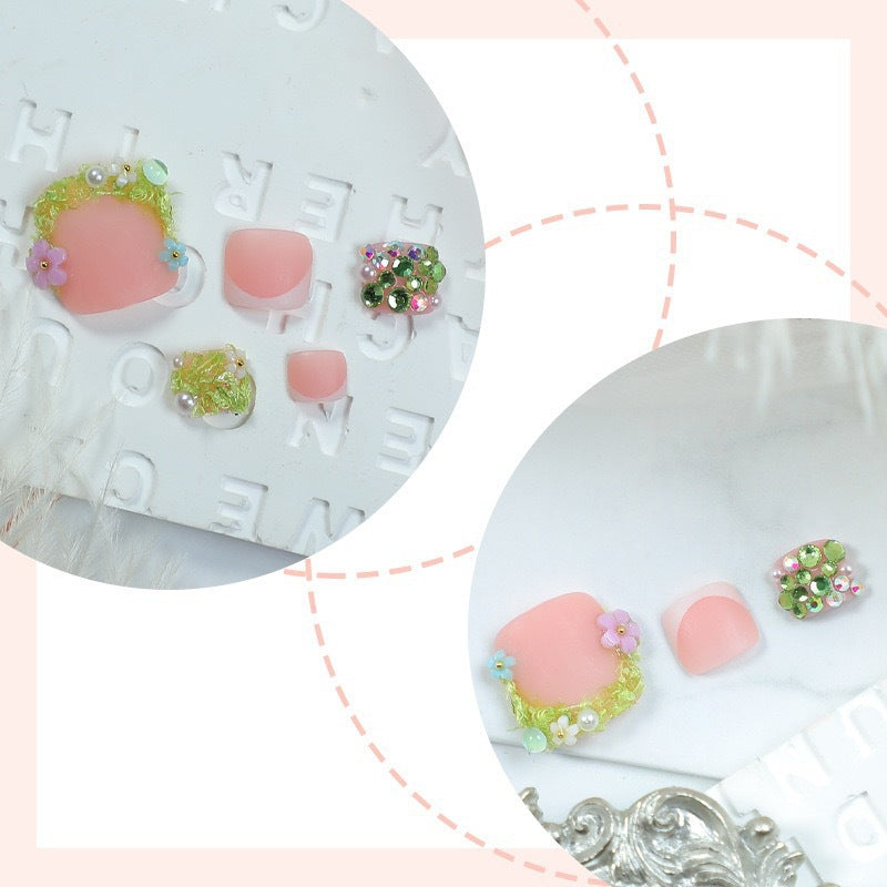 Artificial nail set with floral 3D details and glitter embellishments Stornfield