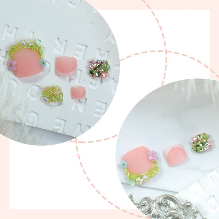 Artificial nail set with floral 3D details and glitter embellishments Stornfield