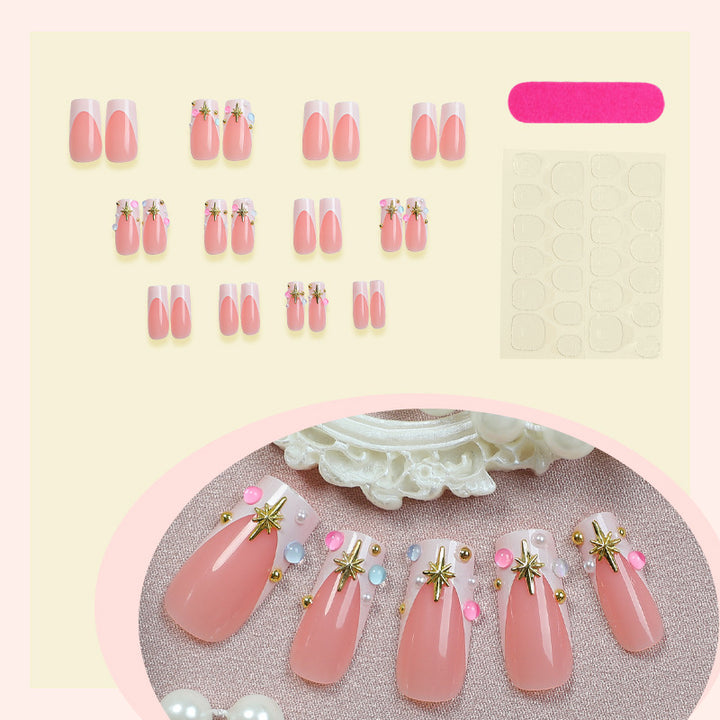 Elegant artificial nail set with floral design and rhinestone accents Stornfield