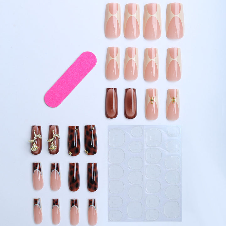 Artificial nails with luxurious embellishments and animalistic design Stornfield