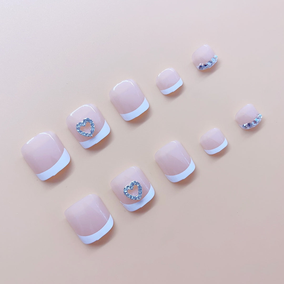Nail art set with elegant glitter and heart decorations Stornfield