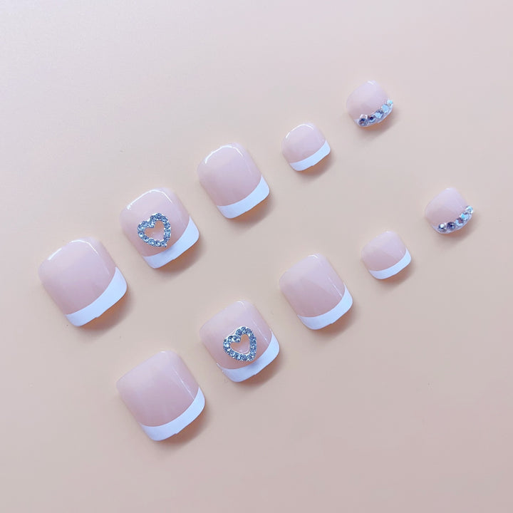 Nail art set with elegant glitter and heart decorations Stornfield