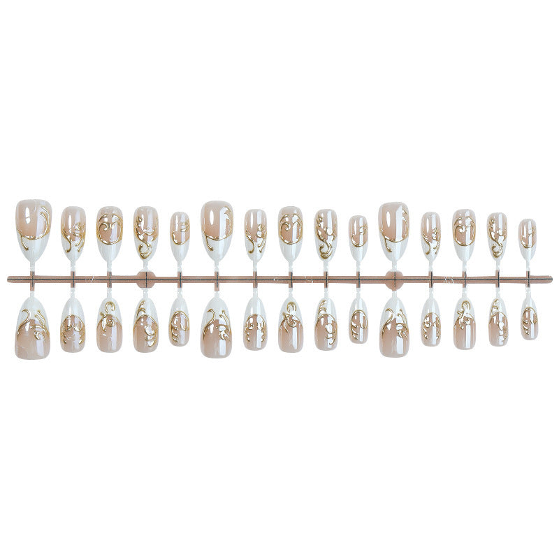 Acrylic nail set with elegant golden decorations Stornfield