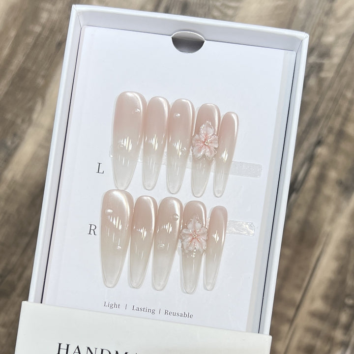 Elegant Stiletto Nail Extensions with Floral Accents Stornfield