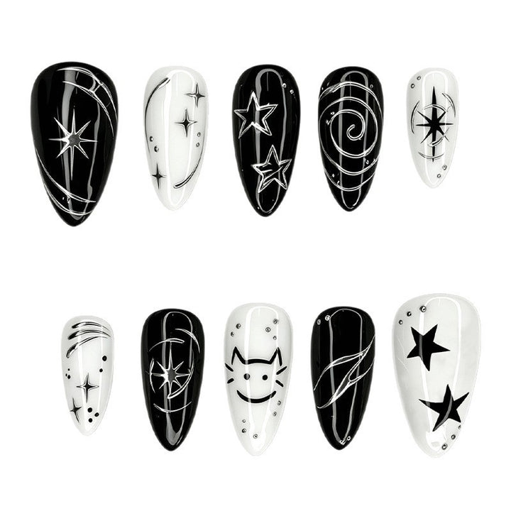 Nail art set with creative star motifs and sparkling accents Stornfield